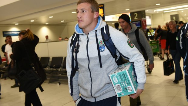 Back in fashion: Trent Hodkinson arrives at Sydney Airport on Thursday afternoon.