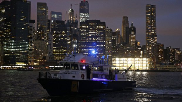 A New York Police Department boat patrols the East River ahead of the July 4 fireworks.