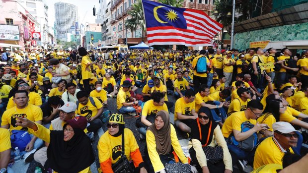 Protesters occupy a street in downtown Kuala Lumpur in November to demand electoral reform and Najib Razak's resignation.