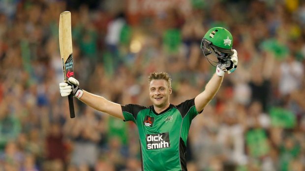 Luke Wright of the Melbourne Stars raises his bat after reaching his century.