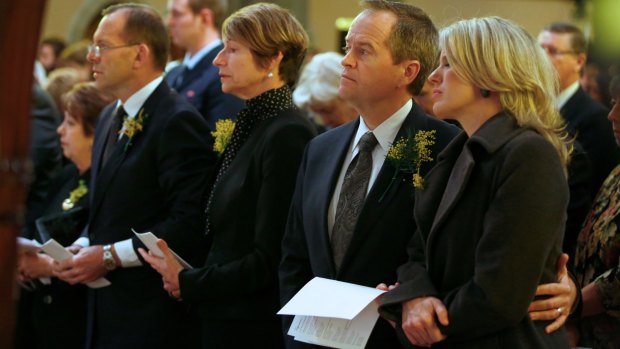 Prime Minister Tony Abbott and Opposition Leader Bill Shorten and their wives attending the service. 