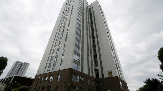 Burnham residential tower on the Chalcots Estate showing the bottom brick section of the building after cladding was removed due to safety concerns.