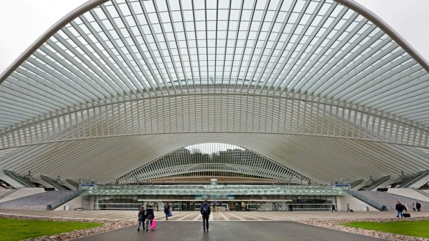 Arrive by train if you can – Guillemins station is a visually stunning, free-flowing architectural marvel.