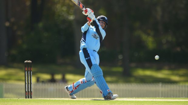 Lashing out: Nic Maddinson bats for New South Wales against the Cricket Australia XI at Bankstown Oval.