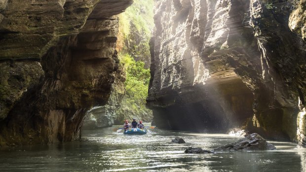 Rafting through Navua River canyon.