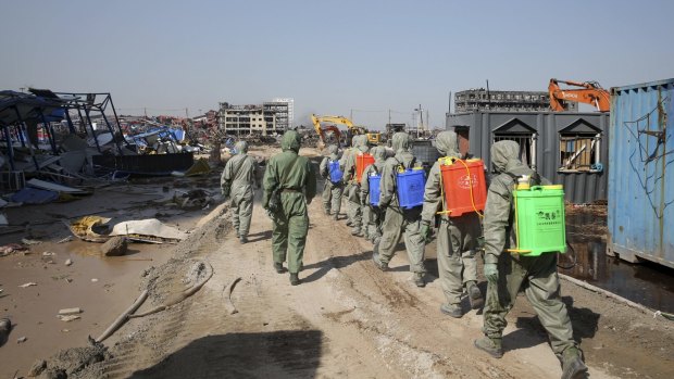 Soldiers among the debris in Tianjin. 
