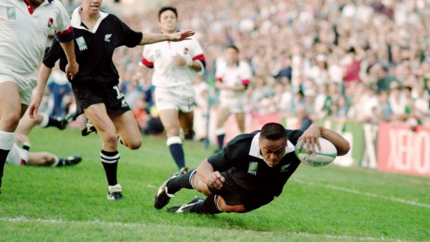 Iconic moment: Jonah Lomu dives over during the 1995 Rugby World Cup match between England and New Zealand in Cape Town.