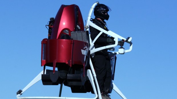 Surfing the skies: Glenn Martin's personalised jetpack makes a demonstration flight in Christchurch.