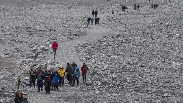 Tourists heading to and from the glacier were required to use the walking track as the no-fly zone was extended.
