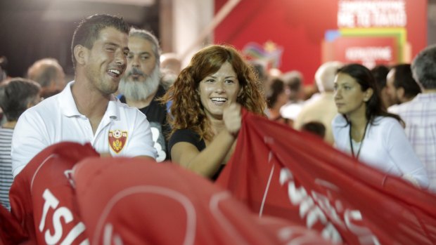 Supporters of the left-wing Syriza party react after the election results in Athens on Sunday.