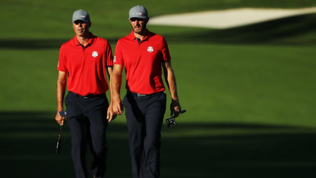 Holding the lead: Matt Kuchar and Dustin Johnson kept the US lead in the afternoon round.
