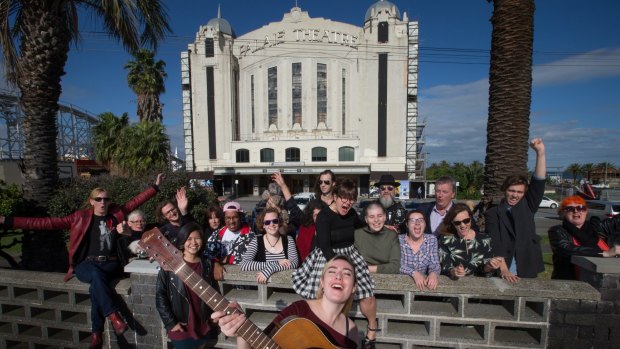 Musicians celebrate the restoration of St Kilda's Palais Theatre. 
