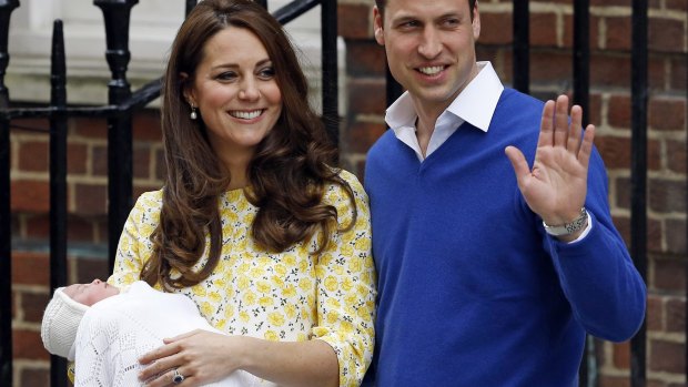 Britain's Prince William and Kate, Duchess of Cambridge, pose with their newborn baby.