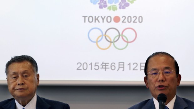 Tokyo 2020 Olympics CEO Toshiro Muto, right, speaks as Tokyo 2020 Olympics President ,Yoshiro Mori listens during a press conference of the Tokyo 2020 Executive Board Meeting in Tokyo.
