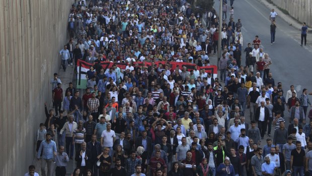 Protesters march in response to the suicide attacks, in Diyarbakir on October 11. 