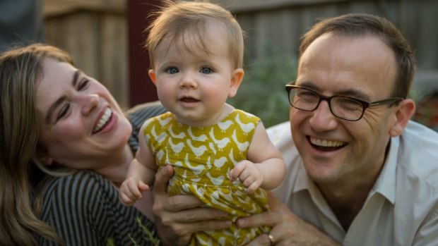 Federal Greens MP Adam Bandt, pictured here with wife Claudia Perkins and their daughter Wren, could be a key player in determining superannuation policies in the new parliament. 