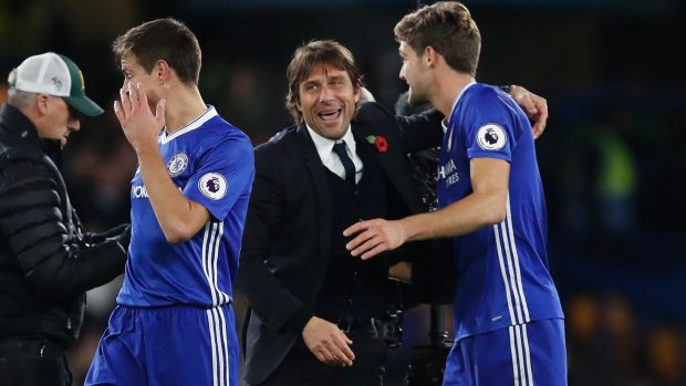 Fantastic: Chelsea coach Antonio Conte is all smiles after the five goal drubbing of Everton.