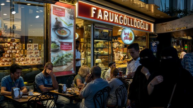 An outpost of Faruk Gulluoglu, a popular baklava chain, at Taksim Square in Istanbul. It is one of more than 950 companies which have been expropriated since last year's failed coup.