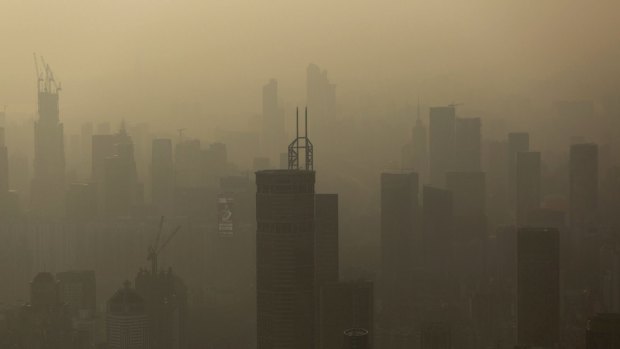 Smog hangs in the air around buildings in the Luohu district of Shenzhen, China.