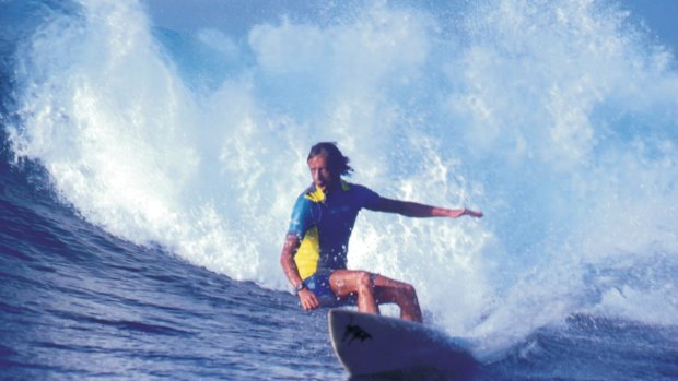 Phil Abraham surfing.