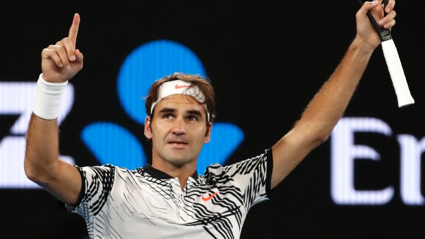 Switzerland's Roger Federer celebrates after defeating compatriot Stan Wawrinka in their semi-final.