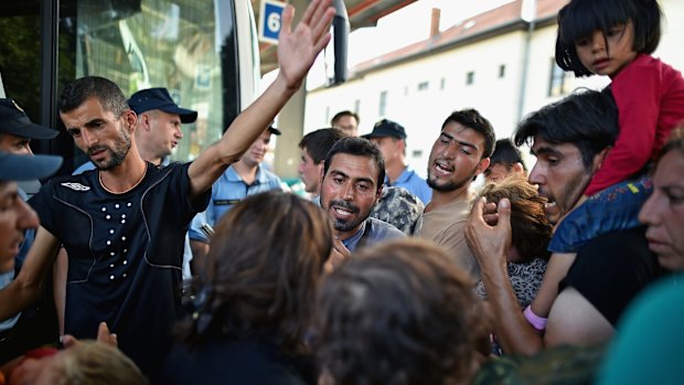 Refugees in crowded conditions in Beli Manastir, near the Hungarian border.