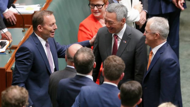  Mr Abbott greets the Prime Minister of Singapore Lee Hsien Loong.