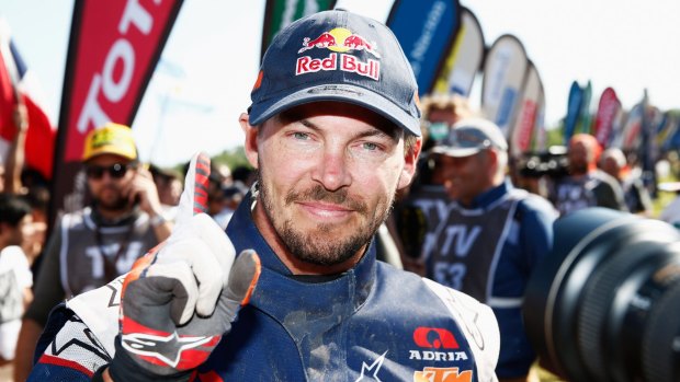 Number one: Toby Price celebrates winning the Dakar Rally. 