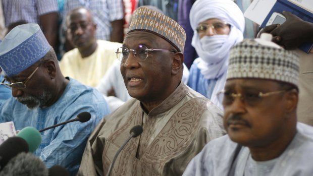 Niger opposition party leader Amadou Boubacar Cisse (centre) at a media briefing before elections results were announced on Tuesday.