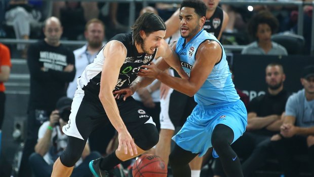 Chris Goulding of Melbourne United drives to the basket.