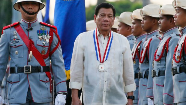 Philippine President Rodrigo Duterte, centre, said his war on drugs will continue for his entire term.