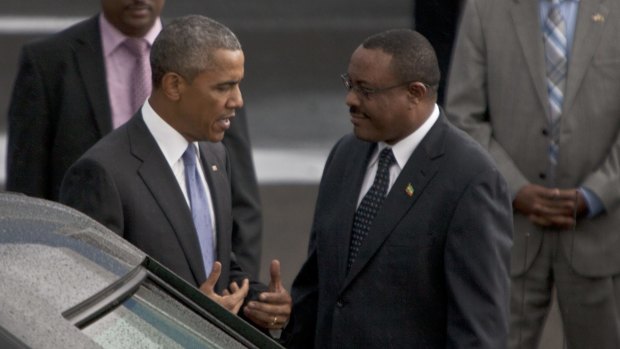 US President Barack Obama with   Ethiopian Prime Minister Hailemariam Desalegn, right, at Bole International Airport Addis Ababa.
