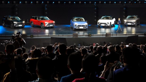 William Li, Founder and Chairman of Chinese automaker NIO launches the NIO ES8 electric SUV in Beijing on December 16.