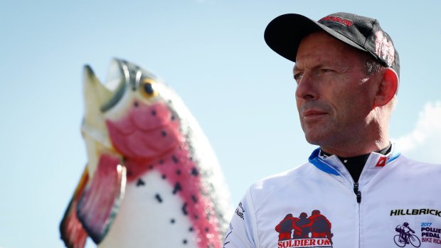 Former prime minister Tony Abbott with the Big Trout.