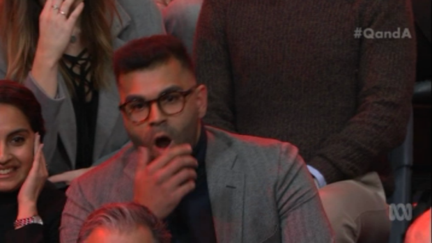 Tarang Chawla reacts in shock as Steve Price responds to his question on <i>Q&A.</i>