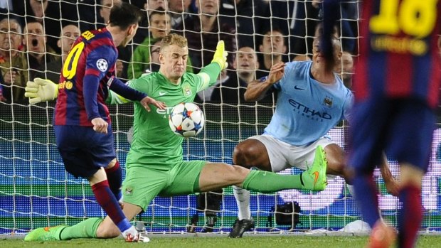 Hart making one of his saves against Lionel Messi.