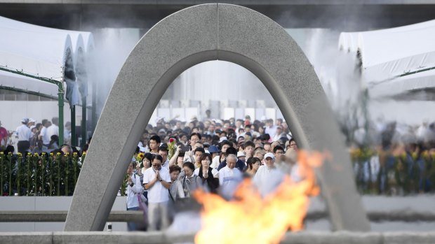 People offer prayers at the Peace Memorial Park in Hiroshima on the 72nd anniversary of the atomic bombing.