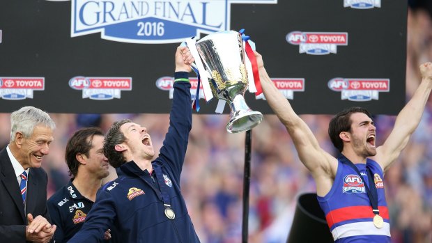 Easton Wood (right) and Bob Murphy lift the club's first premiership trophy in more than six decades.