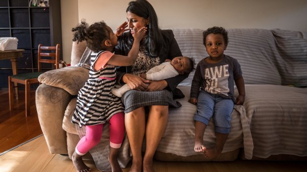 Karina Okotel with her children Hannah, 3, David, 2, and nine-week-old Grace.  