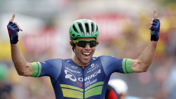 Australia's Michael Matthews celebrates as he crosses the finish line to win the tenth stage of the Tour de France.