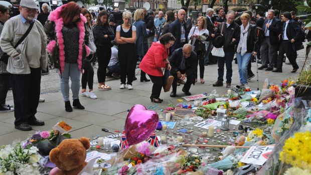 Flowers placed at a vigil in Albert Square, central Manchester, for the 22 people killed in the blast.
