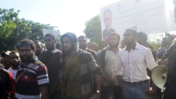 Protesters are seen during an anti-government demonstration at the University of Papua New Guinea on Wednesday.