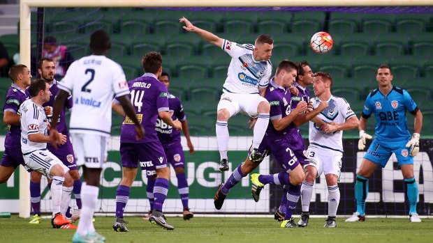 Melbourne Victory's Besart Berisha leaps high in an attempt to head the ball home.