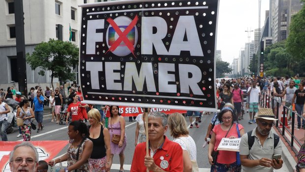 'Temer out': Anti-government demonstrators take to Avenida Paulista em Sao Paulo on Sunday.
