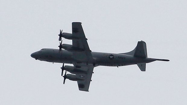 A US P3 Orion surveillance plane flying over Marawi, in the Philippines, earlier this month. Australia is expected to soon send P3 Orions to join the fight.