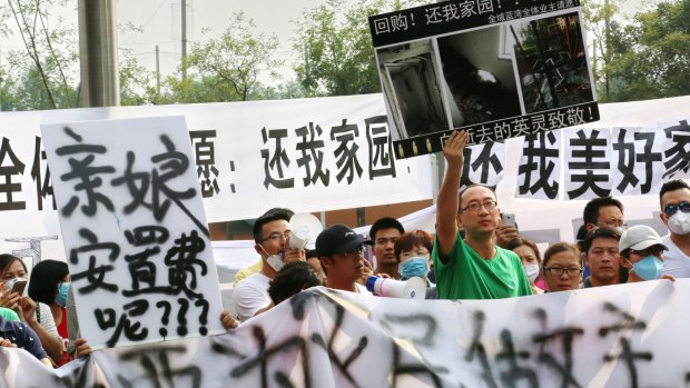 A protest in front of Tianjin TEDA Convention Centre Hotel on Wednesday.