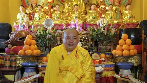 Keeping the Faith: Thich Phuoc Sanh, pictured at a Buddhist temple in Cabramatta, is one of 27 people who discuss their religious beliefs in <i>One Day for Peace</i>.