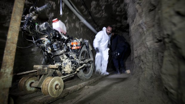 A motorcycle adapted to a rail sits in the tunnel under the half-built house where drug lord Joaquin "El Chapo" Guzman made his escape from the Altiplano maximum security prison in Almoloya, west of Mexico City in July 2015. 