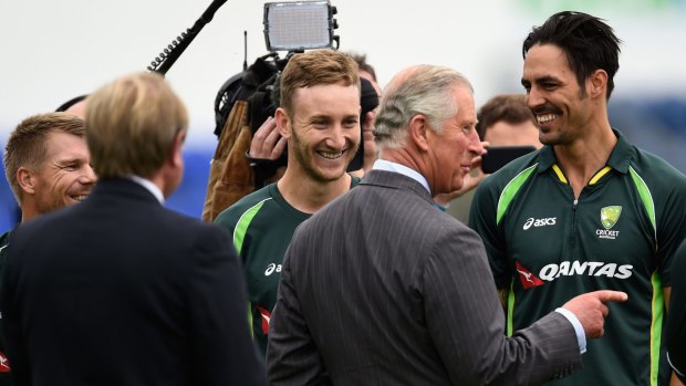Royal reception: Prince Charles shares a joke with Australian cricketers Peter Nevill and Mitchell Johnson during a visit before the first Ashes Test in Cardiff.