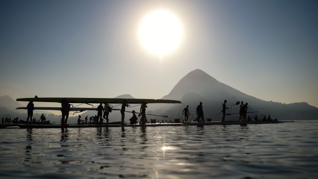 Rowers carry their boats before a training session at the World Rowing Junior Championships at Lagoa Rodrigo de Freitas  in Rio de Janeiro on Wednesday last week. 